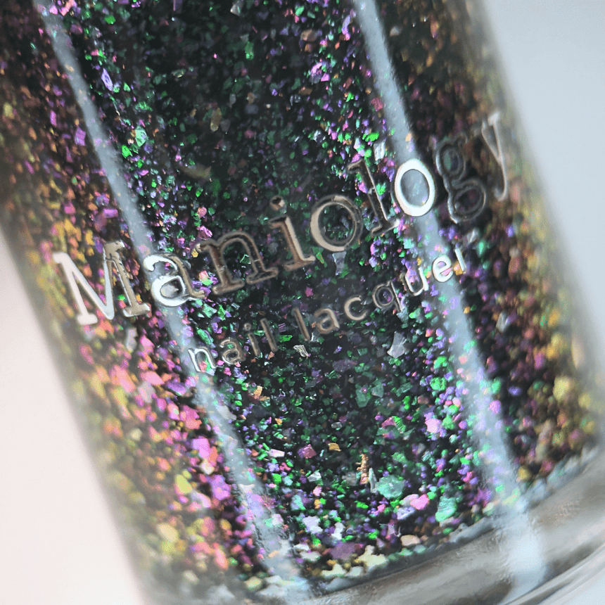 Spectral Shards (P188) - Sheer Tint Black with Green Iridescent Flakies Nail Polish
