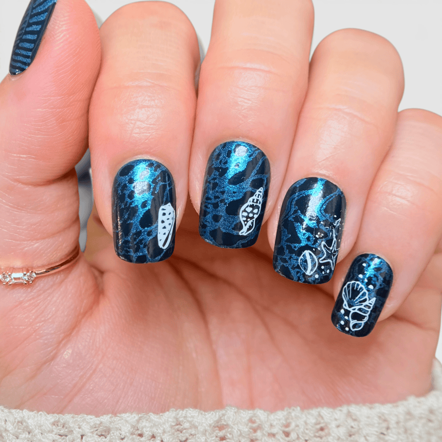 Vitamin Sea: Feelin Nauti (B593) White/Blue Sheer Pearl Duochrome Stamping Polish