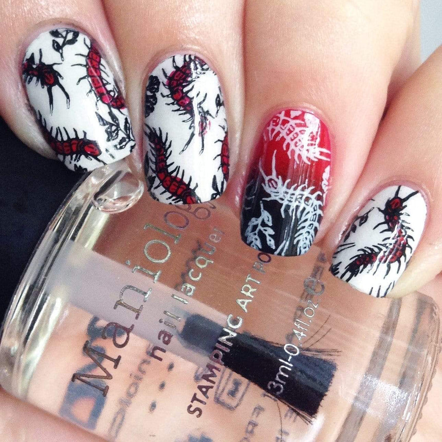 A manicured hand with slithering centipedes design holding a topcoat by Maniology (m159).