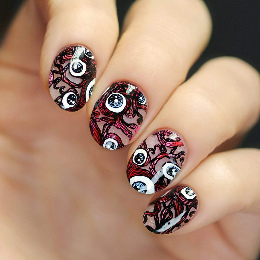A manicured hand with gooey eyeballs design by Maniology (m159).