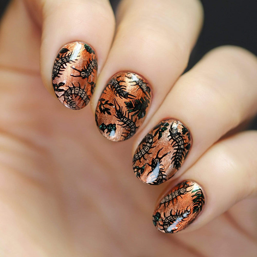 A manicured hand with slithering centipedes design by Maniology (m159).