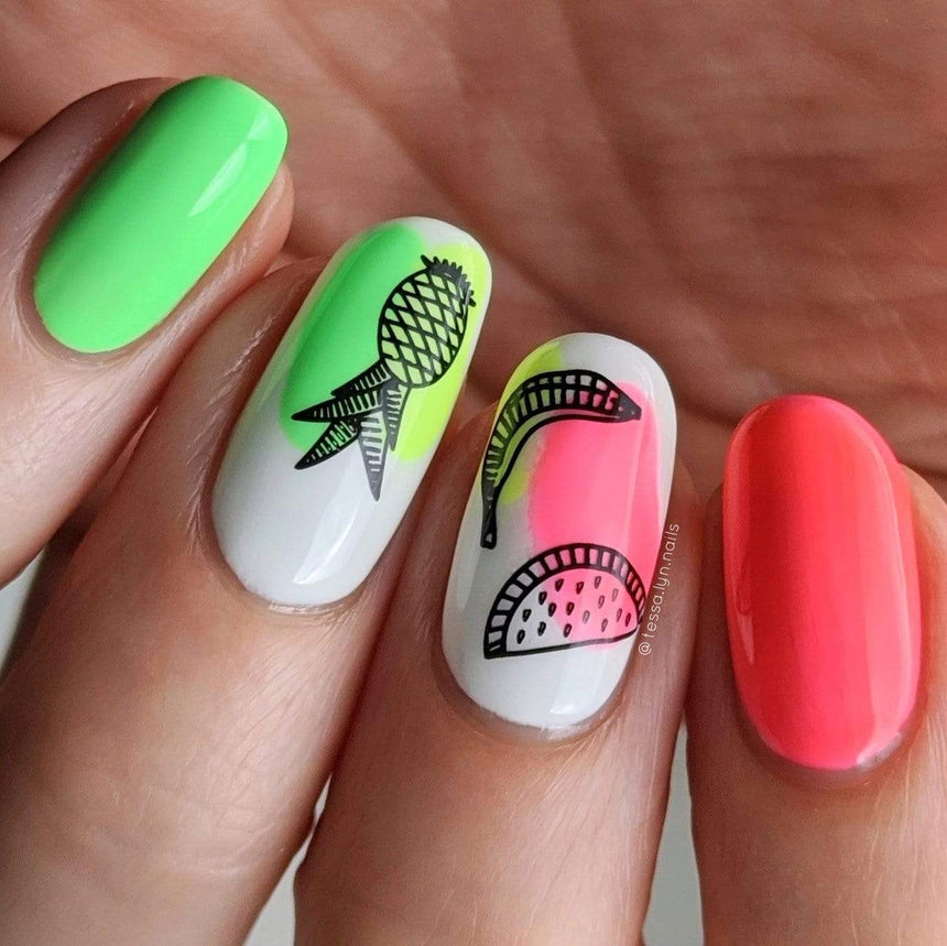 A manicured hand with pineapple, watermelon and banana designs by Maniology Sun & Sand (m104).