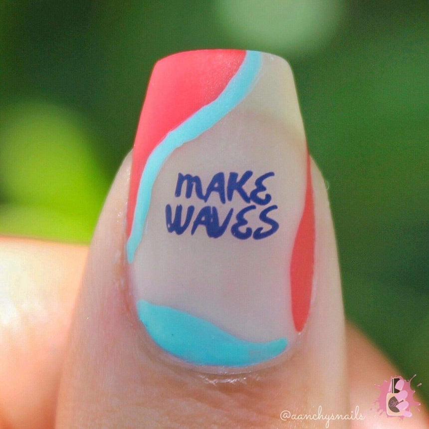 A manicured hand with waves design by Maniology Sun & Sand (m104).