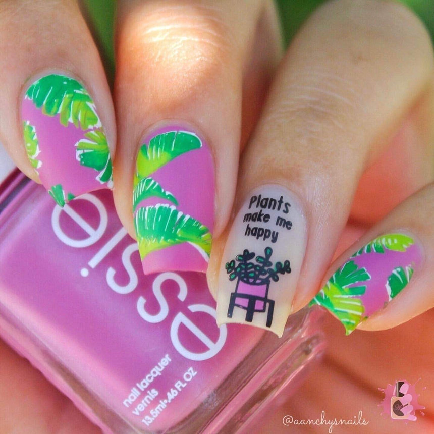 A manicured hand with plants and leaves design by Manilogy (m095) holding a polish.