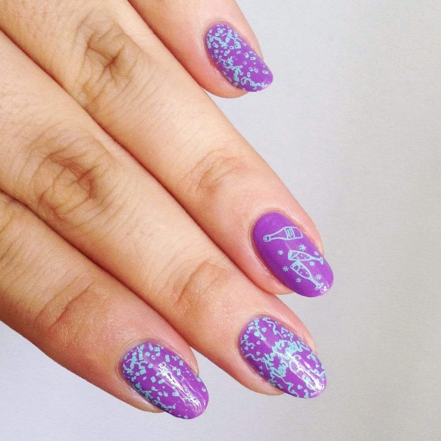 A manicured hand made with icy teal blue Stamping Polish Frosty (B306).