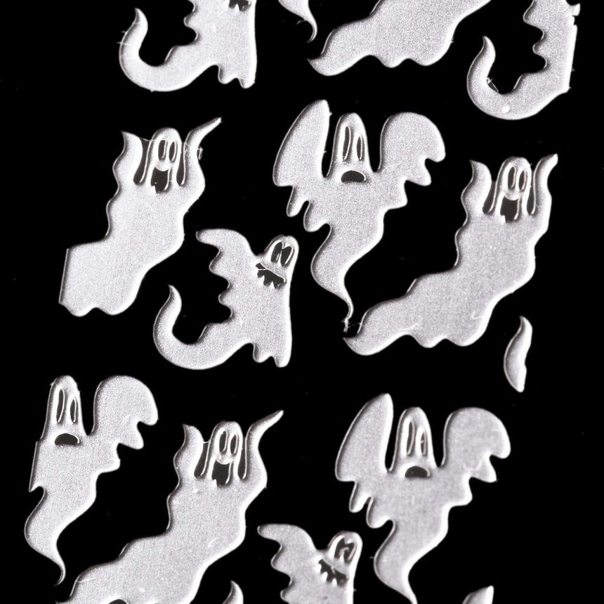 A nail stamping plate with a spooky ghosts, happy ghosts, chubby ghosts, and even more ghosts galore designs by Maniology (m056).