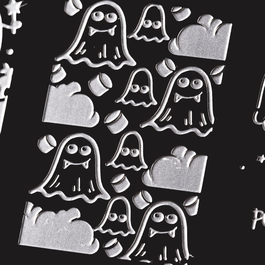 A nail stamping plate with a spooky ghosts, happy ghosts, chubby ghosts, and even more ghosts galore designs by Maniology (m056).