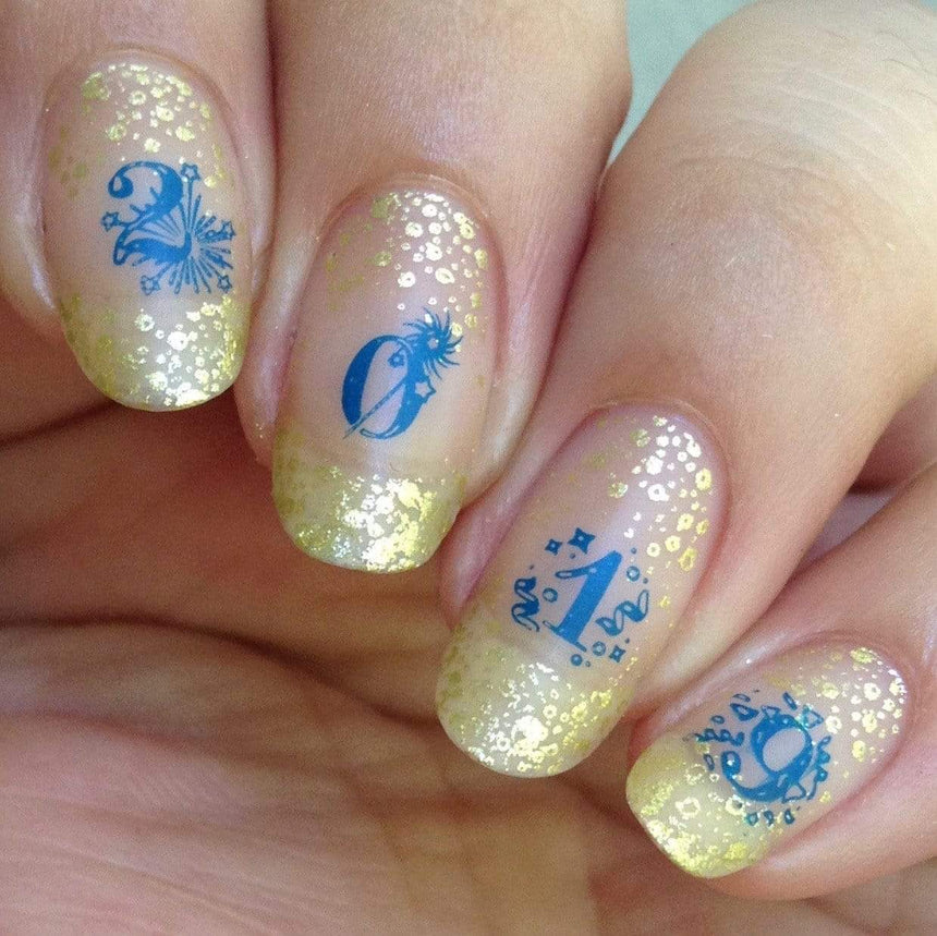 A manicured hand with numbers and pattern designs.