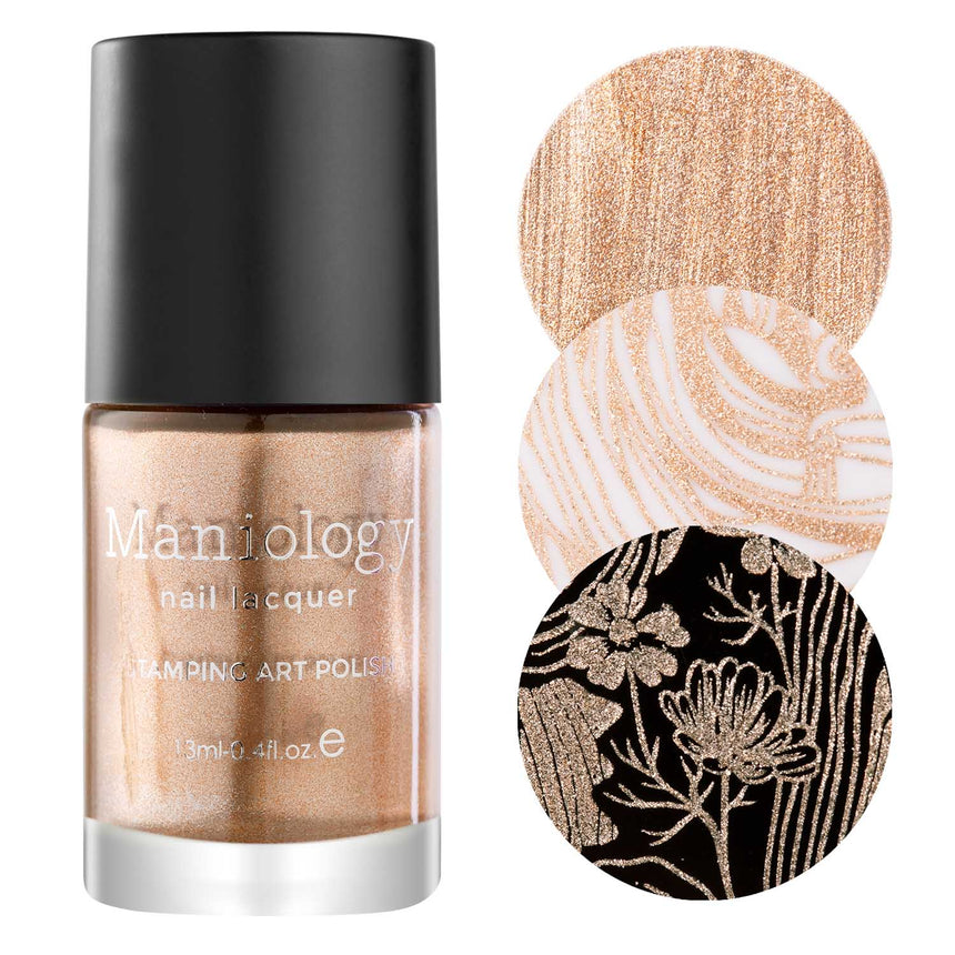 A pale orange metallic stamping polish with a touch of peach and beige for a truly unique hue by Maniology (B361).