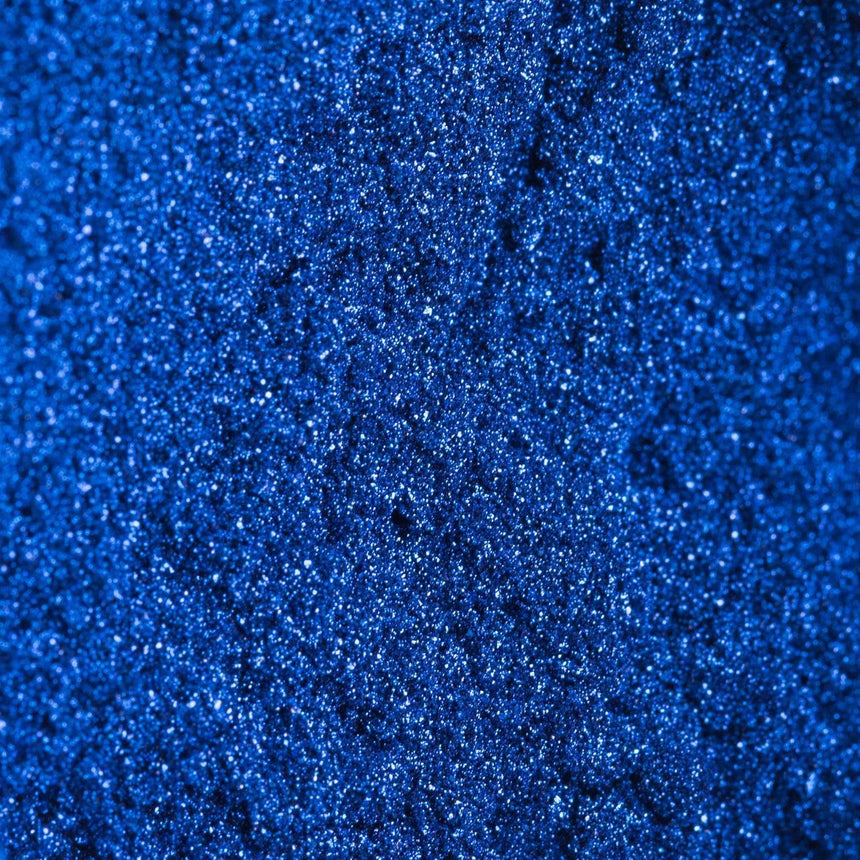 A Sapphire (NA021) Blue Mirror Nail Art Powder with a gentle sheen and shiny mirror finish by Maniology.