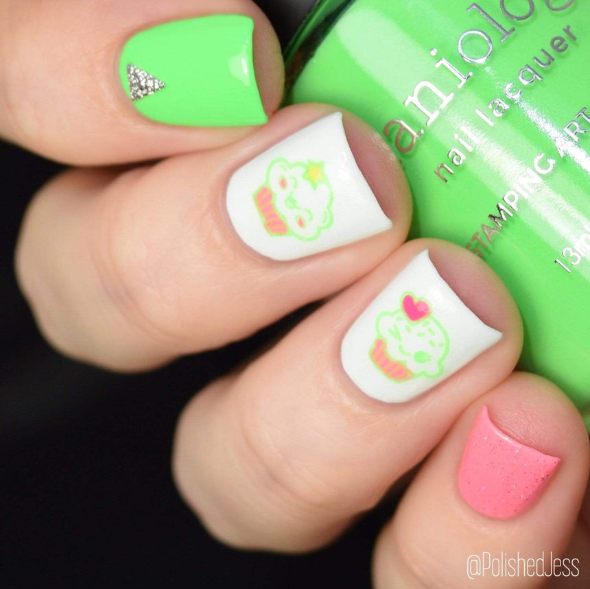 A manicured hand holding Neon Green Stamping Polish from School's Out collection Food Fight (B287).