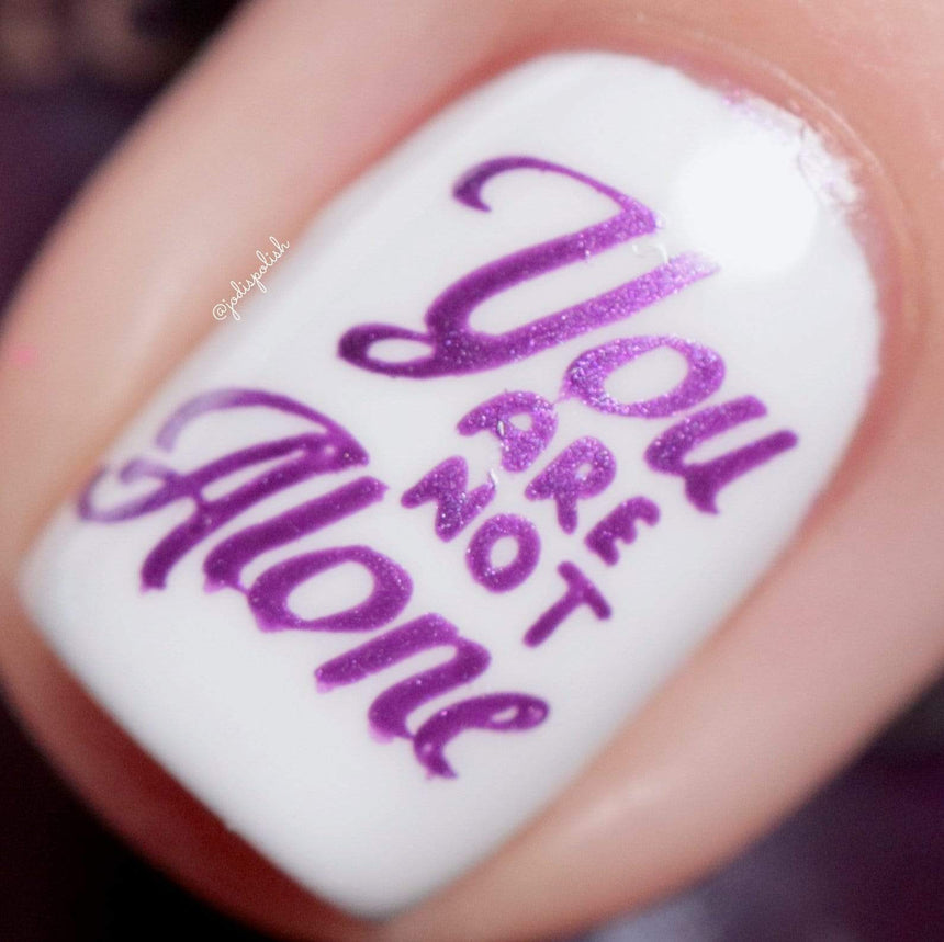 Close up of Maniology Serenity stamping polish used on a stamped image.