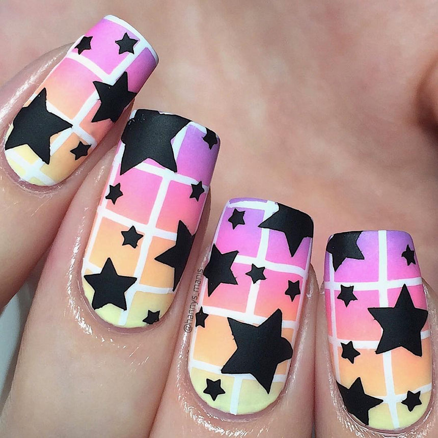 A manicured hand with Shape Nouveau: Back to Basics design by Maniology (BM-XL501).