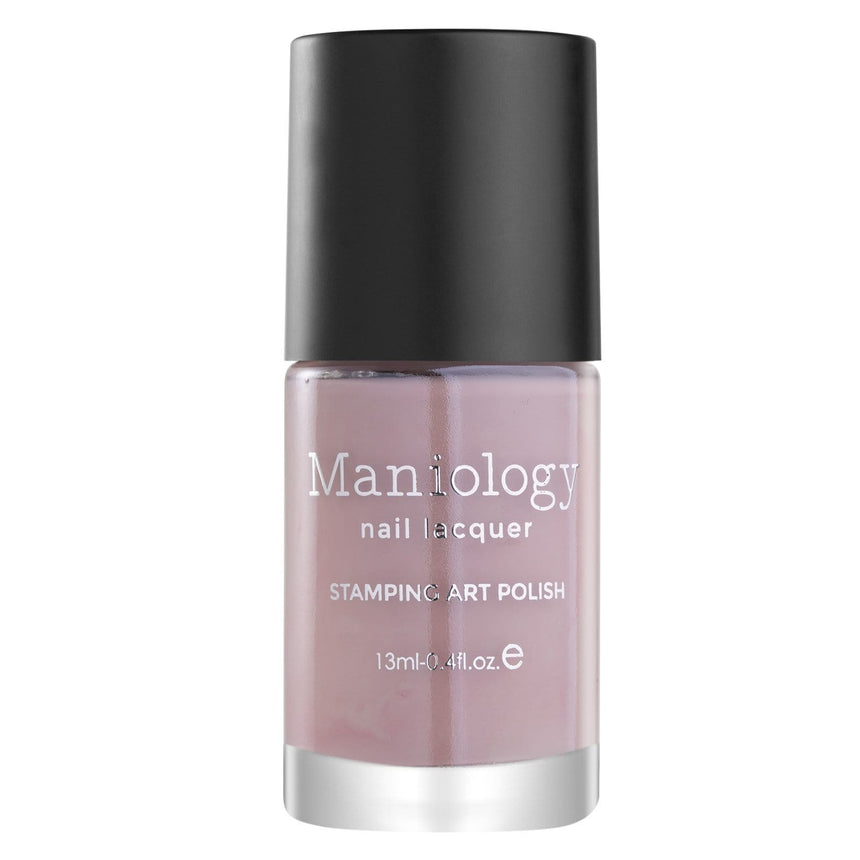 A Nude Pink Cream Stamping Polish that brings a feminine yet neutral color to your traditional winter wardrobe from Snowflake Waltz Collection: Ballet Flats.