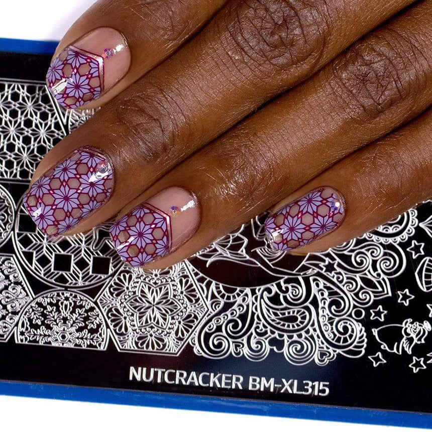 Pretty negative space manicure created with Maniology's Nutcracker Christmas collection.
