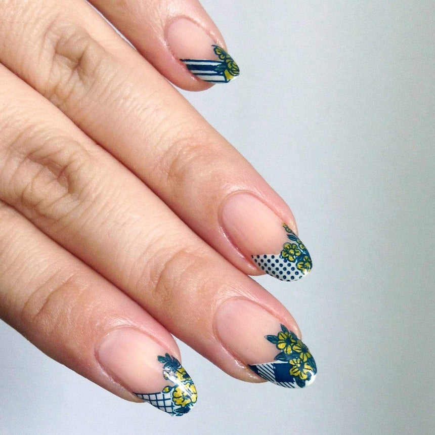 A manicured hand with blooming flowers design from Spring Occasions collections by Maniology (m118)