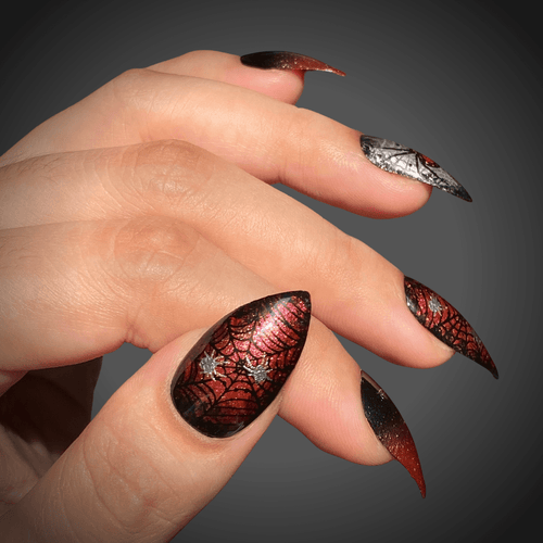 Red and black spiderweb stamped manicure