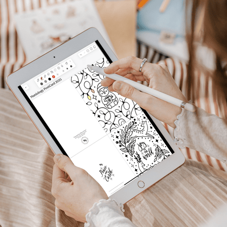 Person using a stylus on a digital tablet with a coloring app.