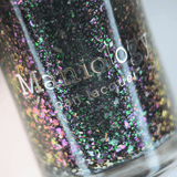 Spectral Shards (P188) - Sheer Tint Black with Green Iridescent Flakies Nail Polish