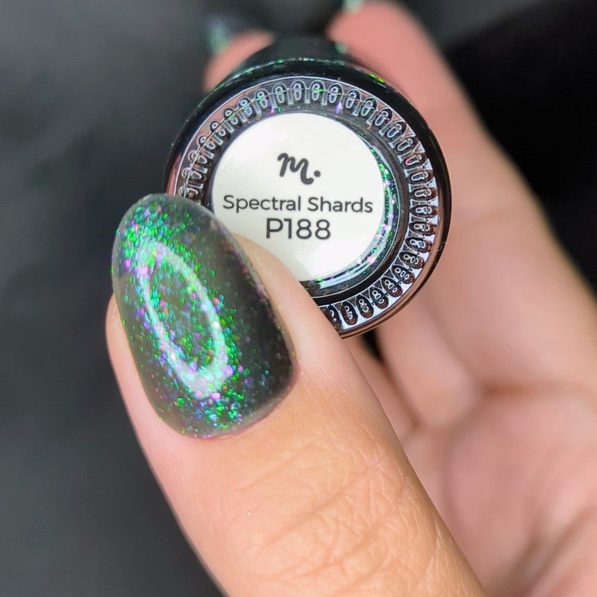 Spectral Shards (P188) - Sheer Tint Black with Green Iridescent Flakies Nail Polish
