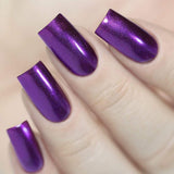 A manicured hand made with Amethyst (NA023) Dark Purple Mirror Nail Art Powder by Maniology.