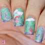  A manicured hand in green with mushrooms and fairies design (Clairestelle8).