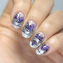 A manicured hand with crystals and glitters design by Maniology.