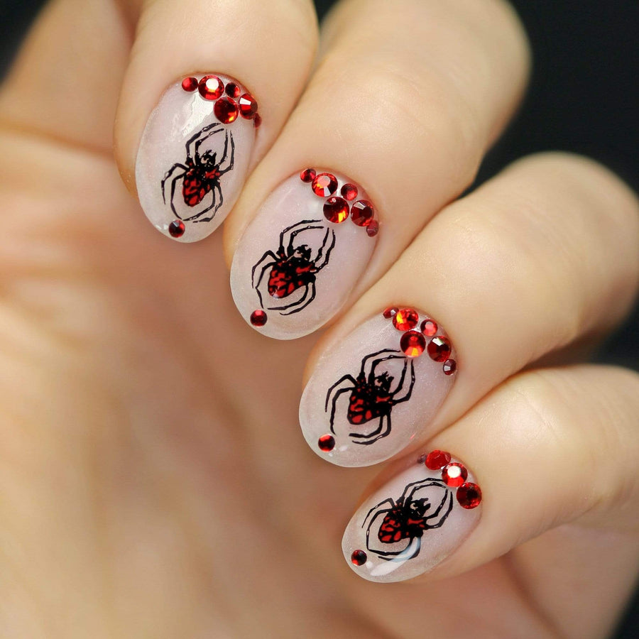 A manicured hand with spiders design by Maniology (m159).