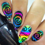A manicured hand in swirl rainbow design holding a polish.