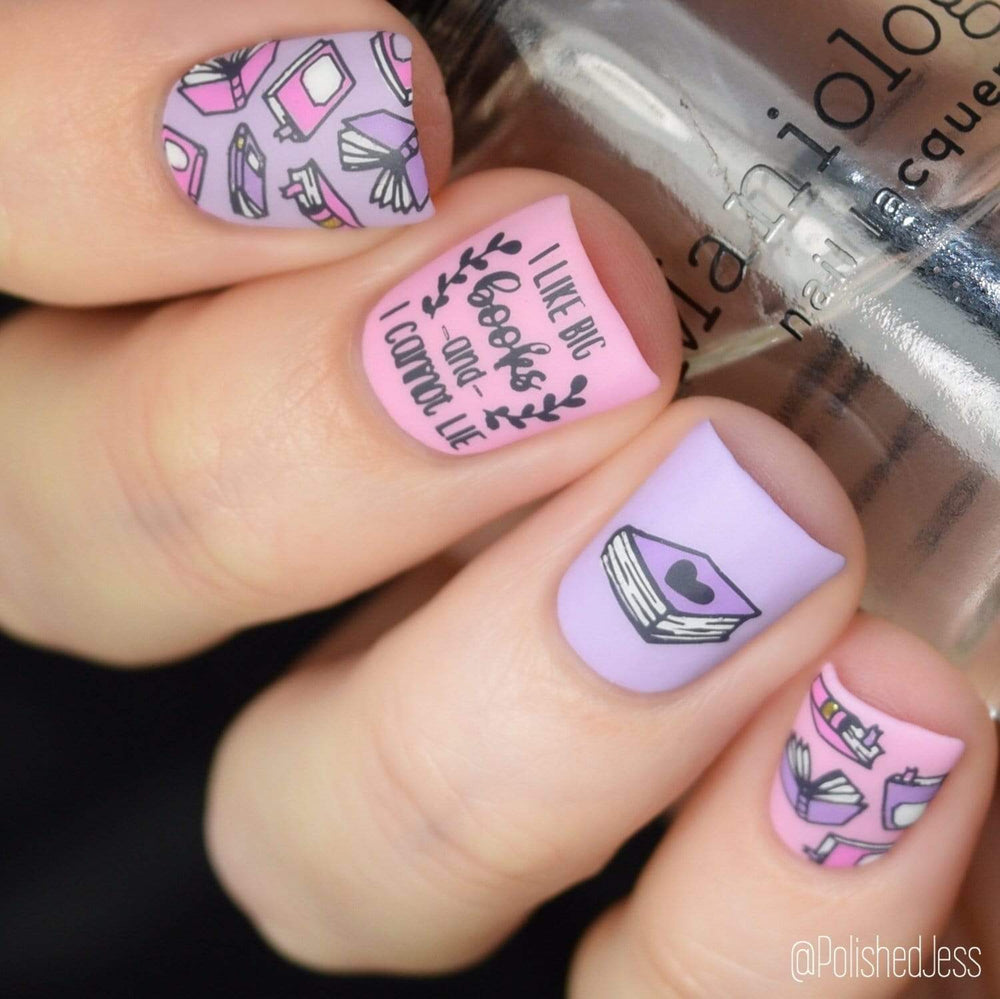 A manicured hand in pink and purple with books design holding a polish by Maniology.