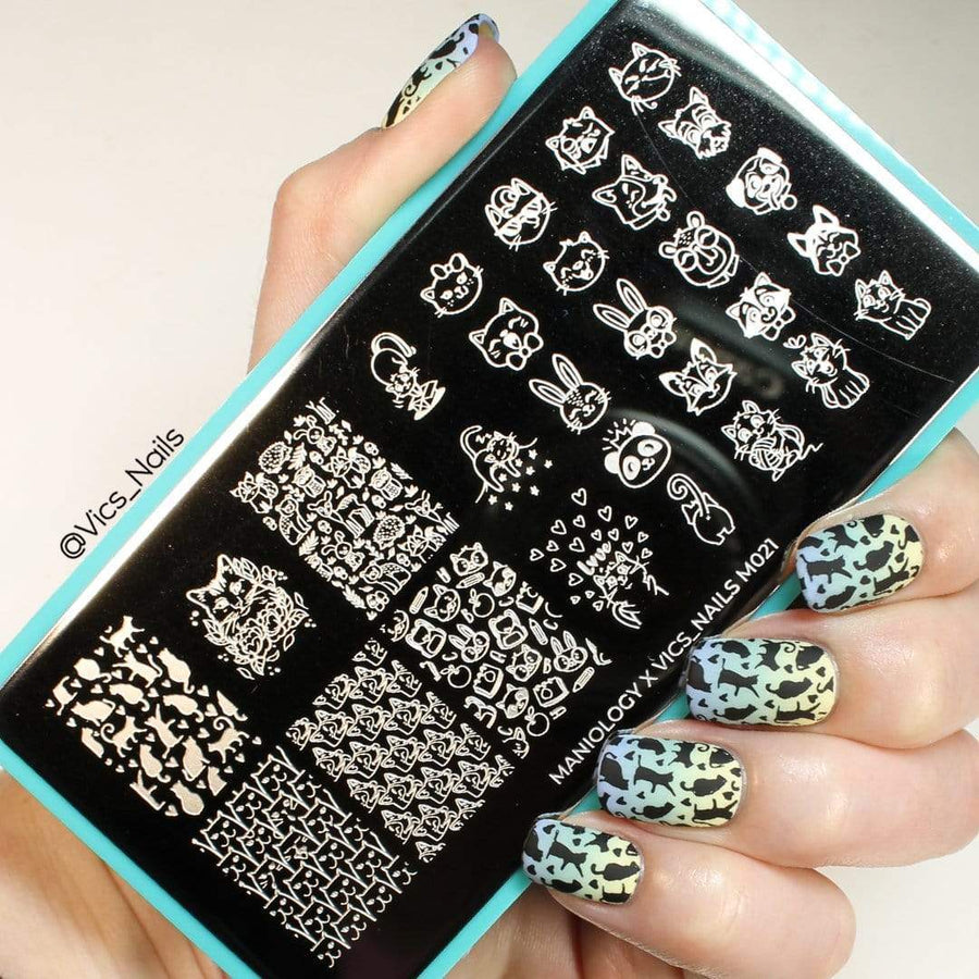 An Artist Collaboration (Vics_Nails) nail stamping plate with 6 full nail and 23 accent designs as well as cuddle cats, dogs, rabbits and more by Maniology (M021).