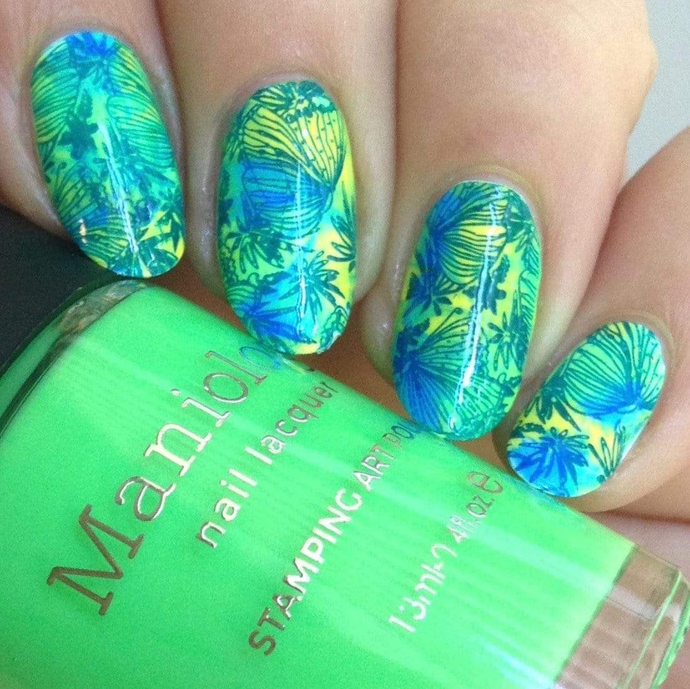  A manicured hand in green with leafy designs holding a polish by Maniology (m070).