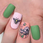 A manicured nail art in green and pink with bees flying in a flower design.