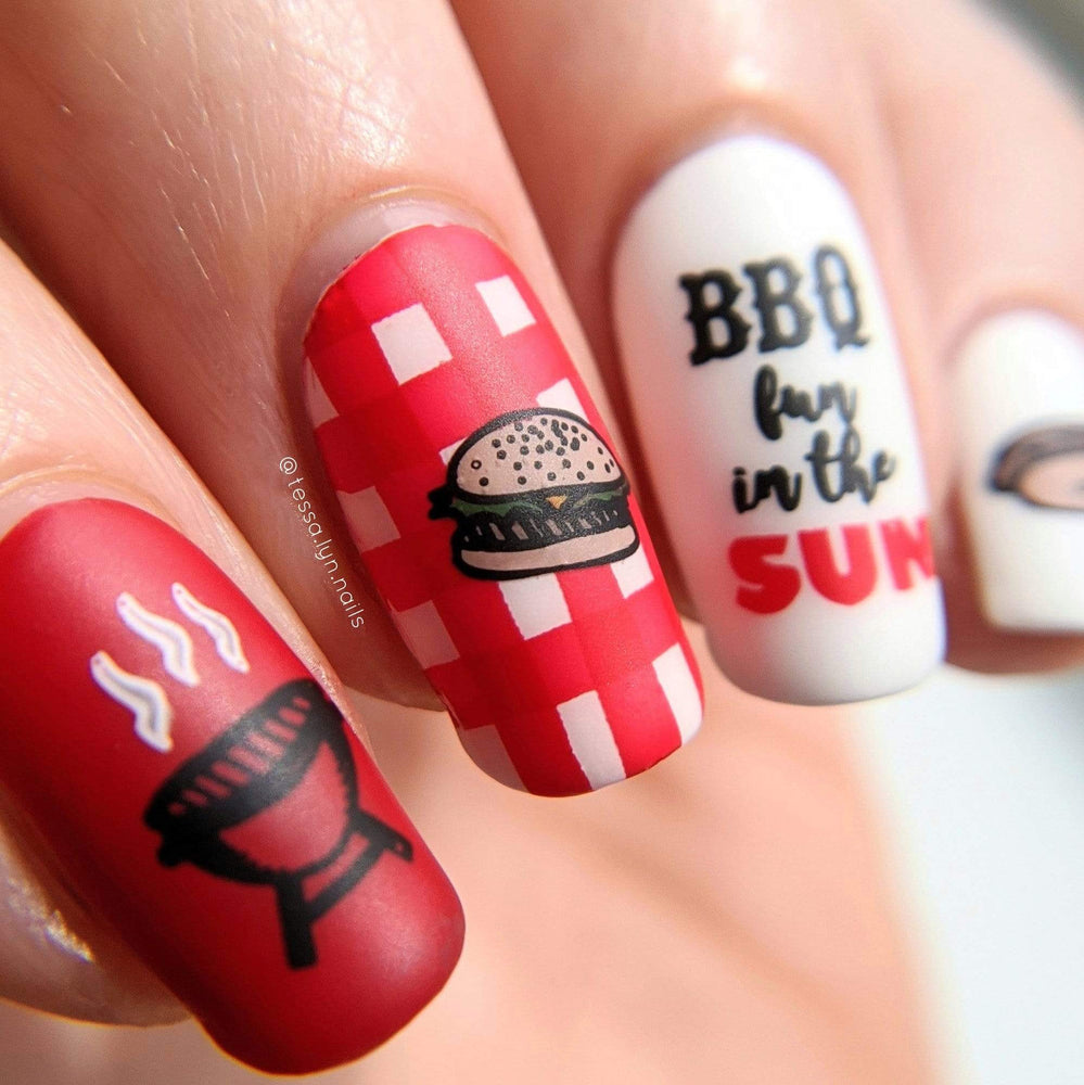 A manicured hand in red and white with burger and barbeque grill designs by Maniology Sweet Thing (m100).