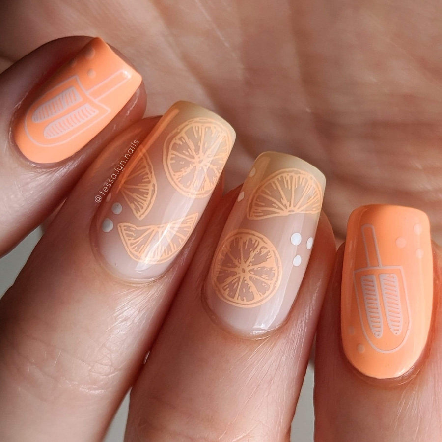  A manicured hand with popsicles and watermelon designs by Maniology Sun & Sand (m104).