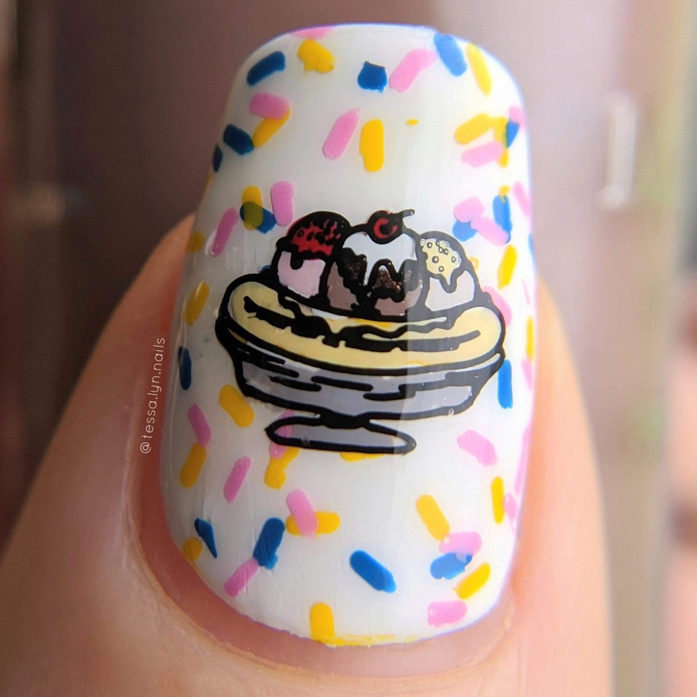 A manicured hand with sprinkles and ice cream design by Maniology Sweet Thing (m100).