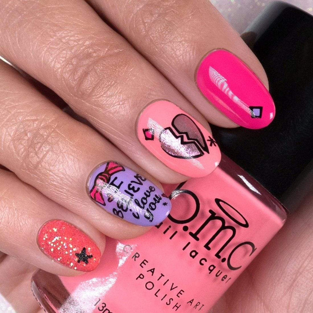 Pink manicure with tiny details made with Maniology's pencil stamper. 