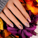  A manicured hand with Holiday Harvest design by Maniology (m023).