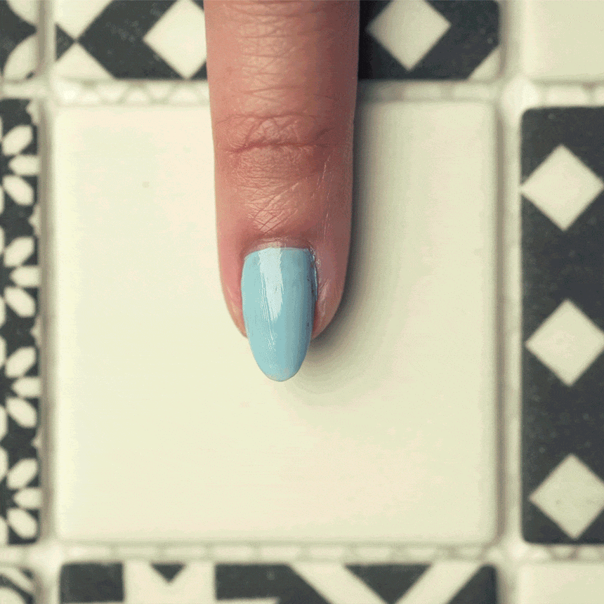 A manicured hand, stamped by banana fruit design  by Maniology (m028).