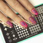 A manicured hand in pink with layered tile design over a nail stamping plate by Maniology (m029).