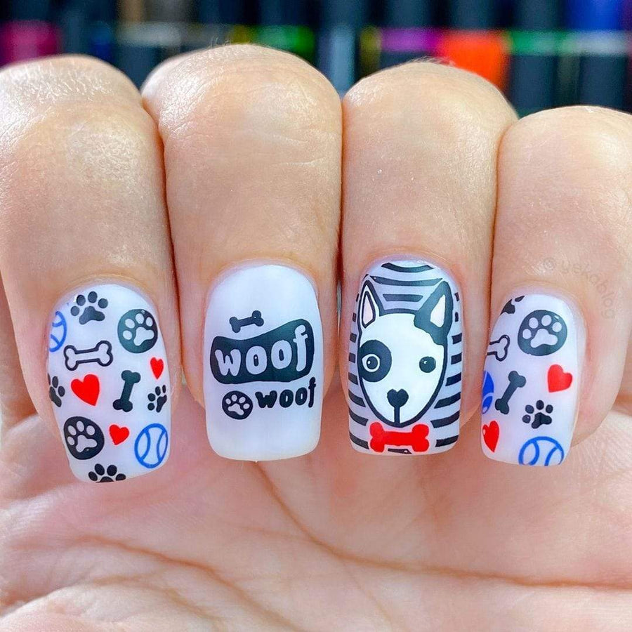 Manicure of Maniology plate M143 featuring dogs and dog bones