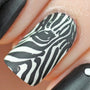 A manicured hand with zebra design in black and white by Maniology (m135).