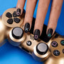 A manicured hand with PlayStation design by Maniology (m049).