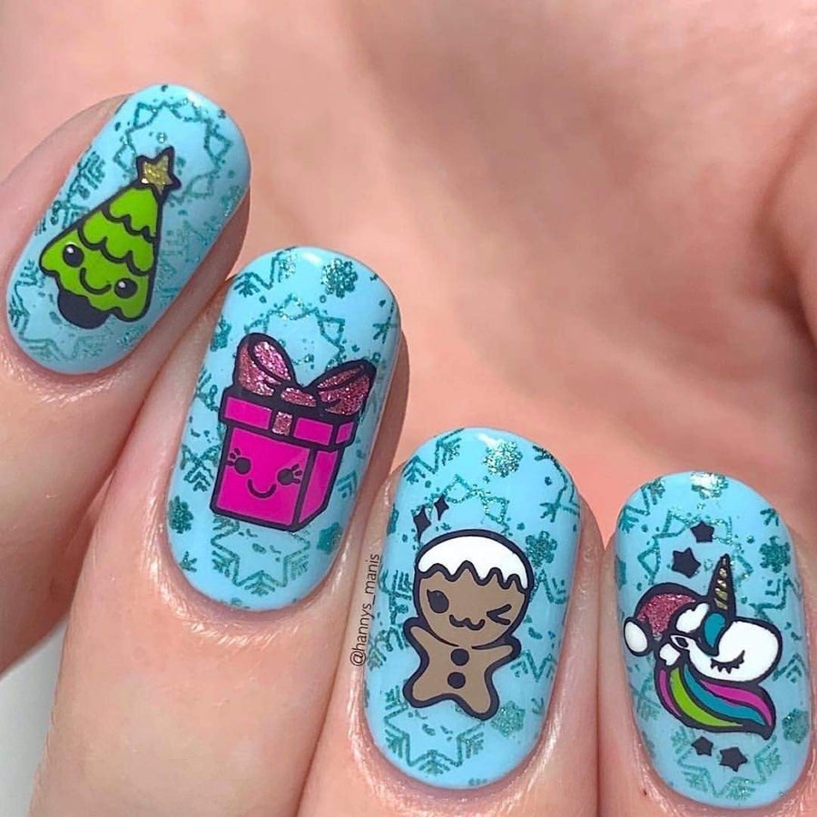 A manicured hand with Kawaii Christmas: Santa's Helpers design by Maniology (m039).