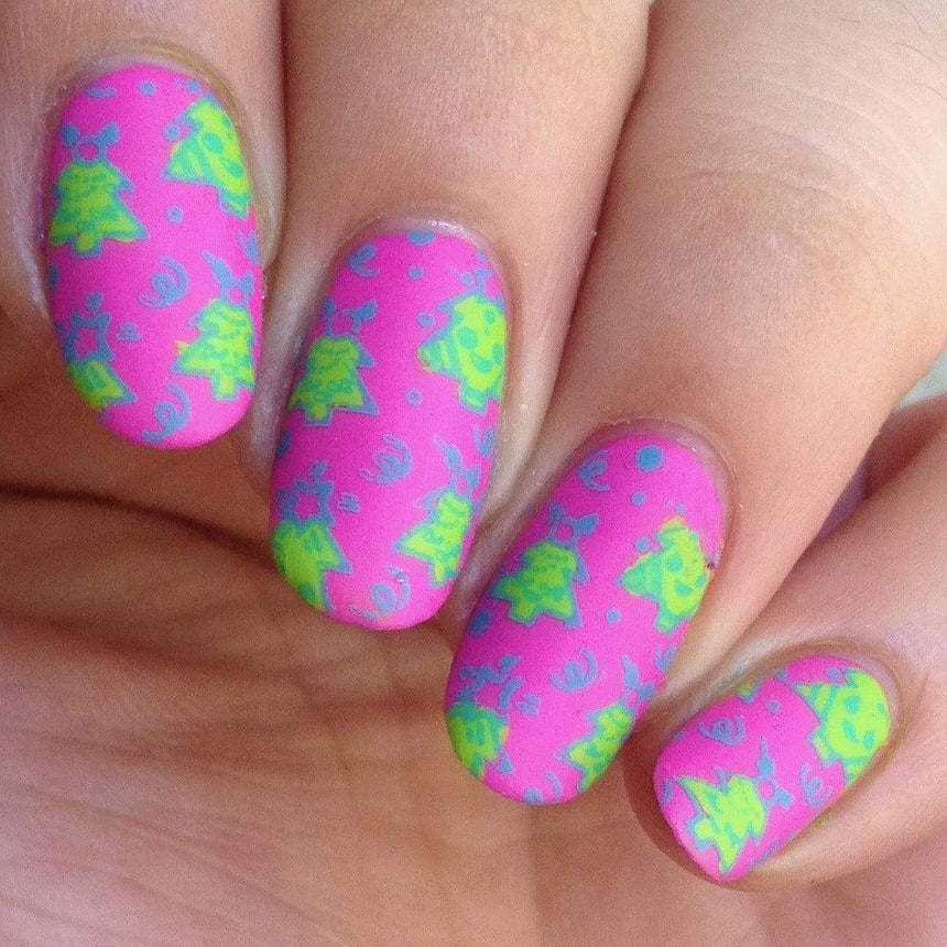 A manicured hand made with Jingle Bell Rock Collection by Maniology.