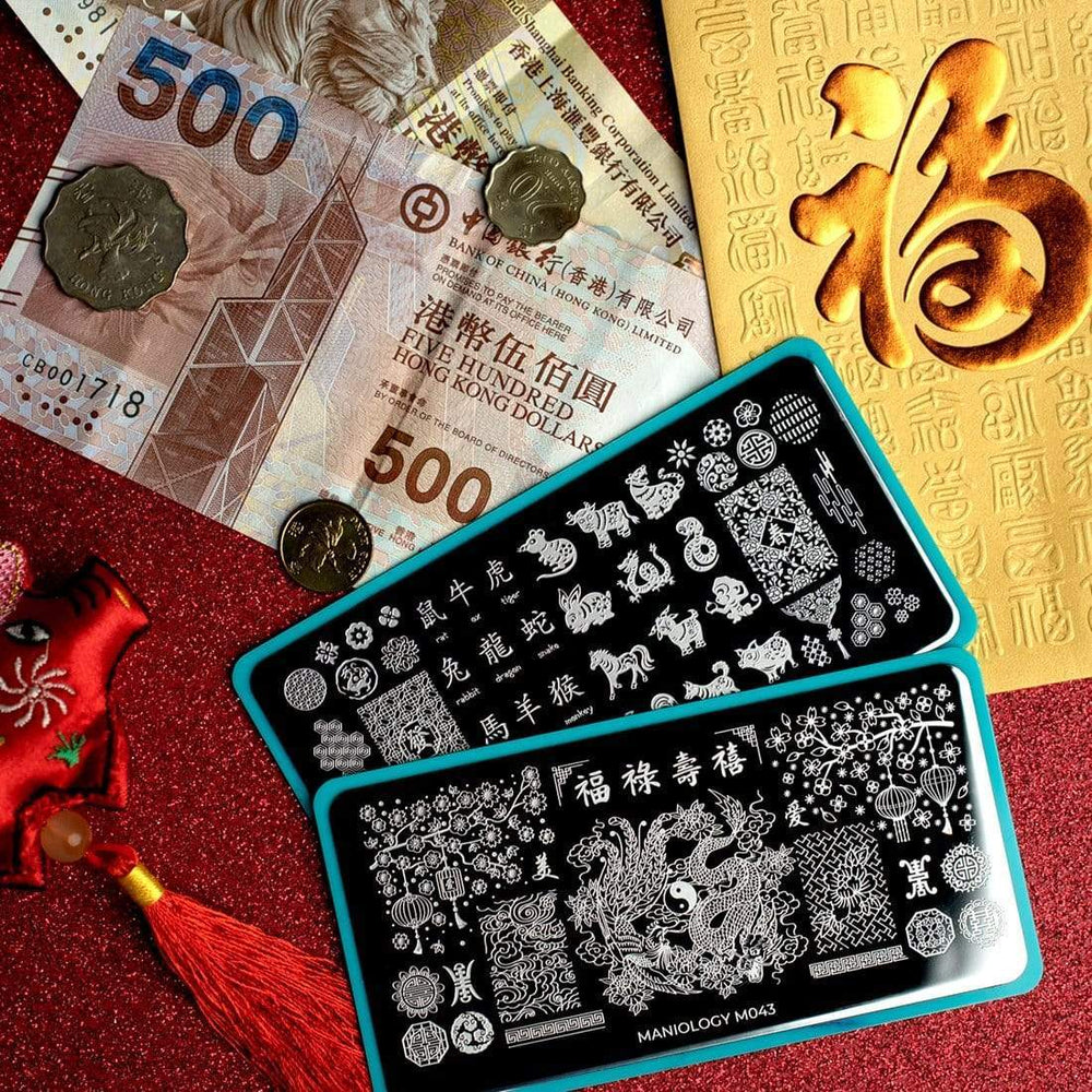 A nail stamping plate with cherry blossoms, paper lanterns, dragon, phoenix, and prosperous symbols design by Maniology (m043).