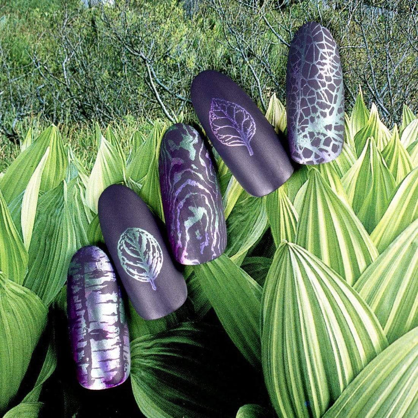 Beautiful dark manicure made with Maniology's Delirium stamping polish.