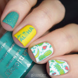 A manicured hand with Pineapple Whip: Party Like a Pineapple designs holding a polish by Maniology (m051).