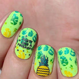 A manicured hand with Pineapple Whip: Party Like a Pineapple designs by Maniology (m051).