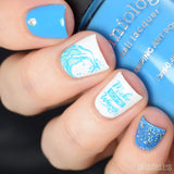 A manicured hand holding Neon Blue Stamping Polish from School's Outcollection Blue Glue (B288).